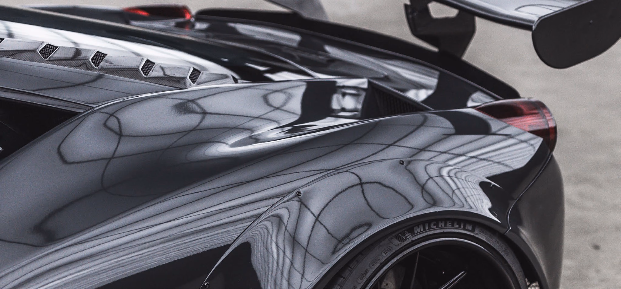 Dark wrapped performance car